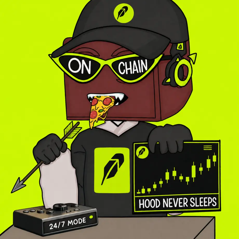 HOODES trader holding a market chart